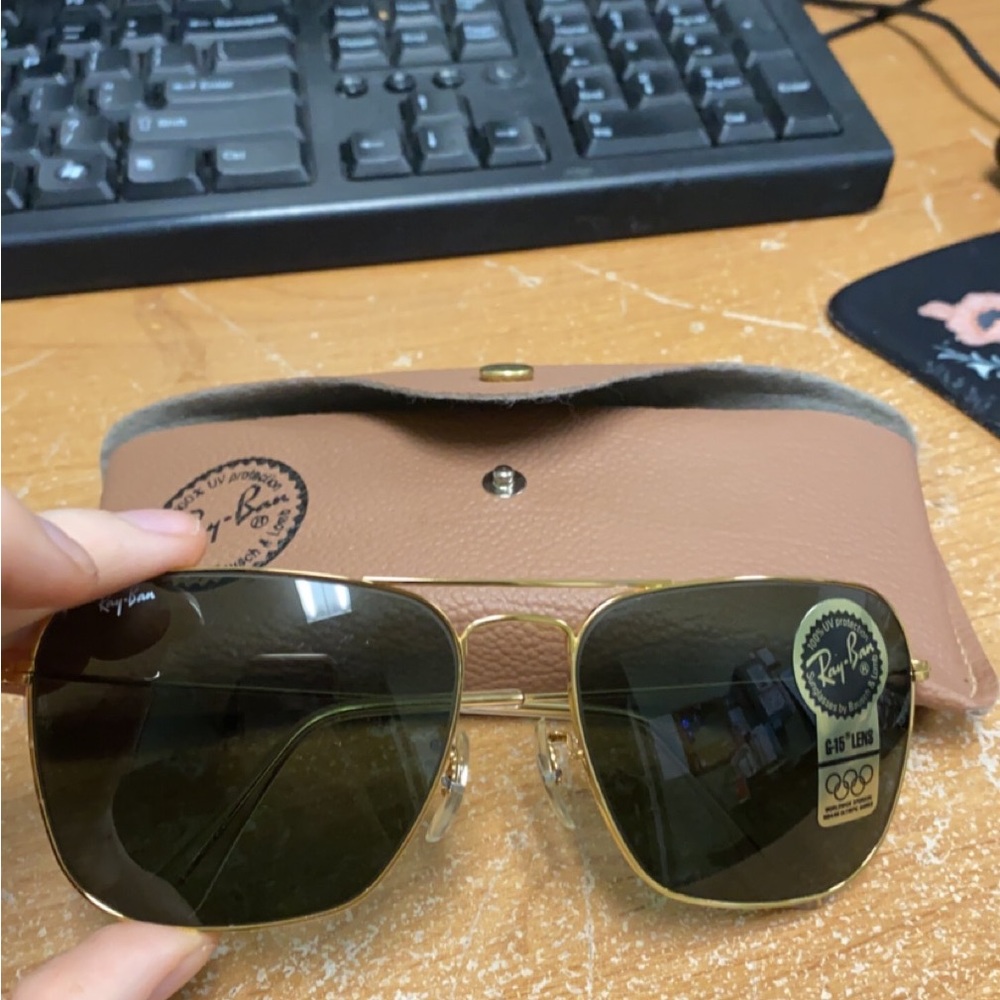 Ray bans sunglasses with sticker still on it